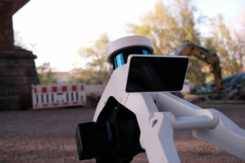 Mobile mapping trolley with a tablet display standing on a closed-off street